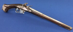 An antique  17th century French Flintlock Pistol. Caliber 14mm. Length 58cm. In very good condition. Price 7.500 euro