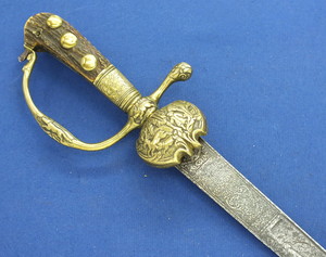 An Antique 18th century German Hunting Sword, circa 1730, length 77 cm, in very good condition. Price 975 euro
