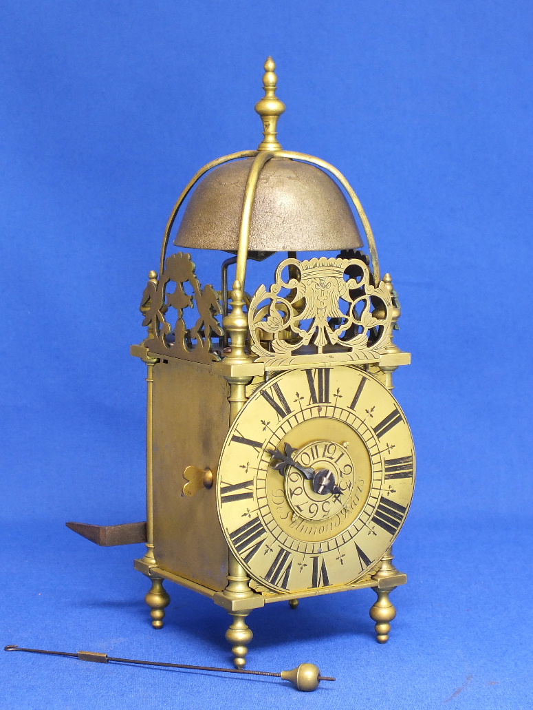 An Antique 18th century miniature French Lantern clock by De Saint Blimond a Paris. Height 26 cm. Price 5.000 euro