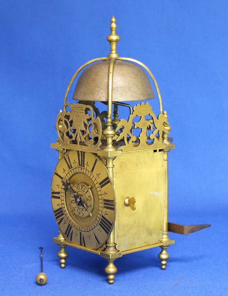 An Antique 18th century miniature French Lantern clock by De Saint Blimond a Paris. Height 26 cm. Price 5.000 euro