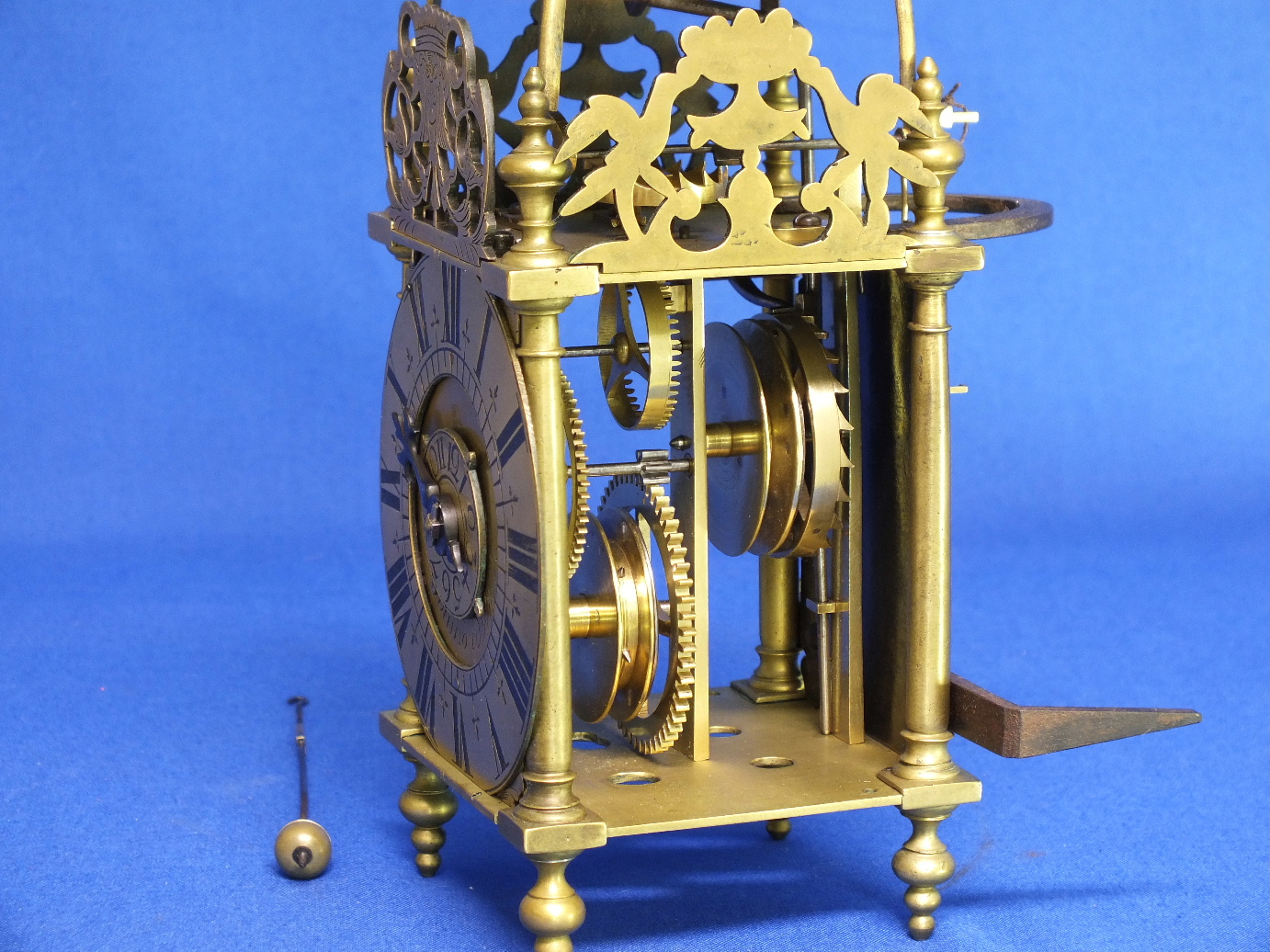 An Antique 18th century miniature French Lantern clock by De Saint Blimond a Paris. Height 26 cm. Price 5.000 euro