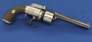 An antique 19th century English 6 shot .54 bore Transitional double action Percussion Revolver by CHARLES OSBORNE LONDON. Length 29cm. In very good condition.
