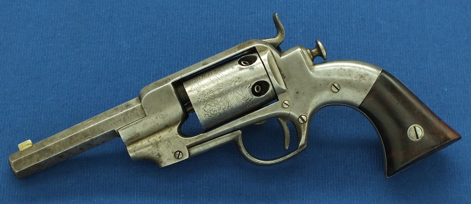 An antique American Allen&Wheelock Side-hammer first type Belt Model 5 shot percussion Revolver. 32 Caliber, 4 inch barrel. Length 25cm. In very good condition.