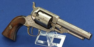 An antique American Engraved Whitney  second model 1st Type 5 shot Pocket percussion Revolver. ,31 Caliber. 4 inch barrel. Length 25cm. In very good condition. Price 1.550 euro.