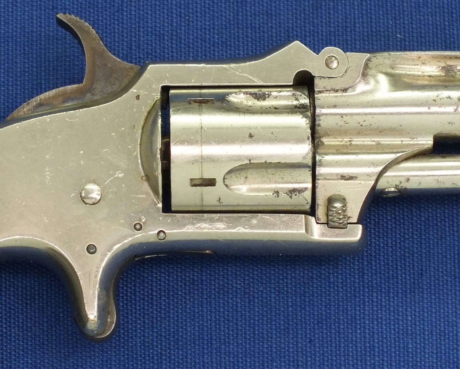 An antique American Nickel plated Marlin XXX Standard 1872 5 shot 30 Rimfire pocket Revolver. Fluted cylinder. Hard Rubber grips. Lenght 19 cm. In very good condition. Price 675 euro