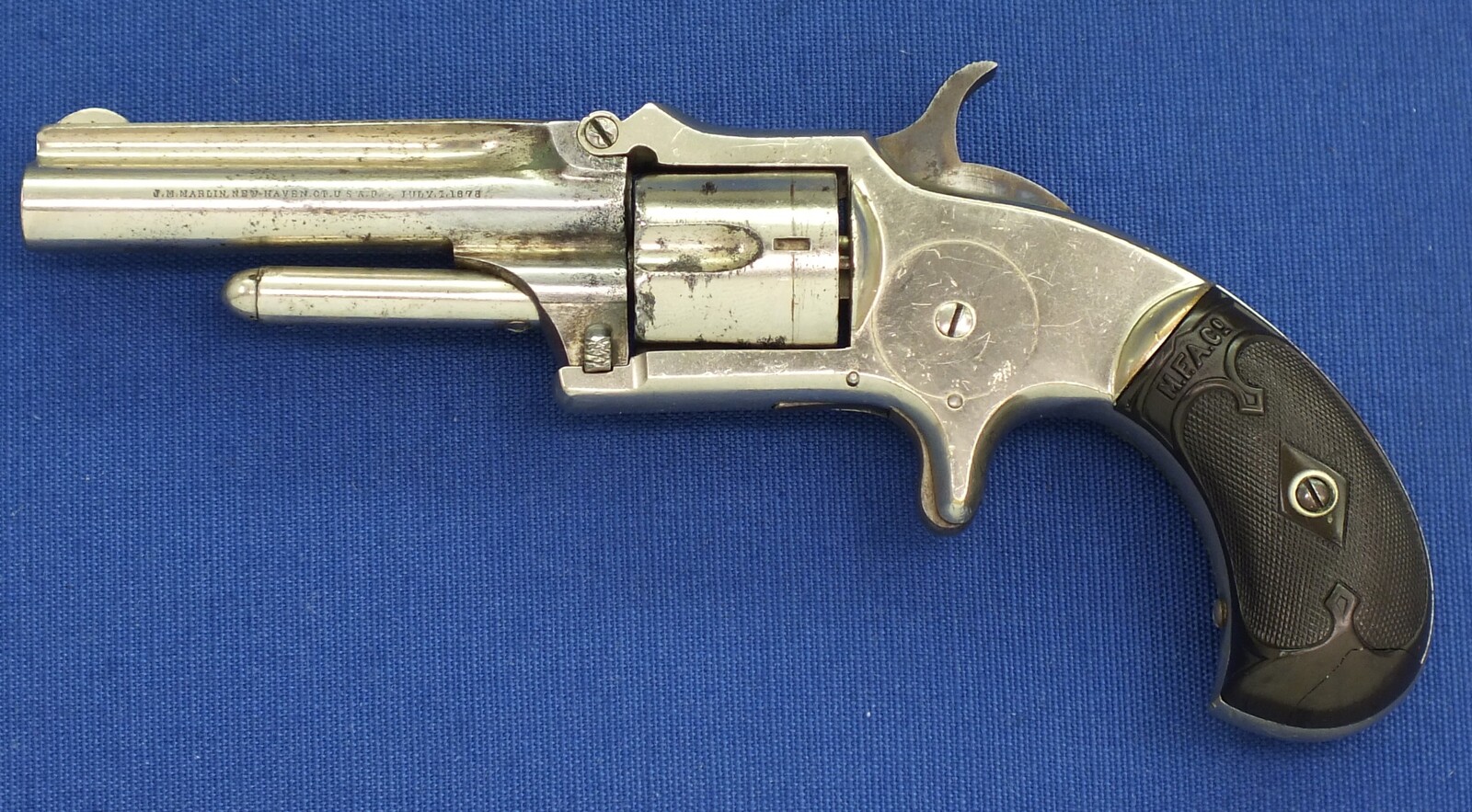 An antique American Nickel plated Marlin XXX Standard 1872 5 shot 30 Rimfire pocket Revolver. Fluted cylinder. Hard Rubber grips. Lenght 19 cm. In very good condition. Price 675 euro