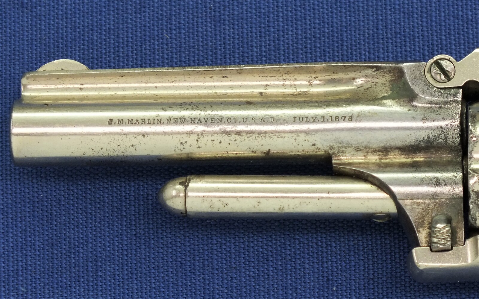 An antique American Nickel plated Marlin XXX Standard 1872 5 shot 30 Rimfire pocket Revolver. Fluted cylinder. Hard Rubber grips. Lenght 19 cm. In very good condition. Price 675 euro