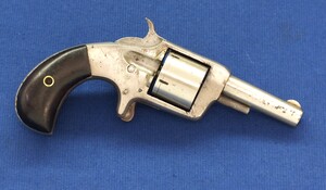 An antique American Nickel Plated VOLUNTEER Suicide special 5 shot single action 32 rimfire Revolver. Length 17cm. In very good condition. 