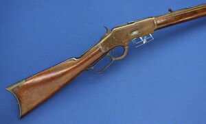 An antique American Special order Winchester Model 1873 Rifle with set trigger and 28 inch octagonal Barrel. Caliber 38-40. Length 119cm. In very good condition. Price 3.500 euro.