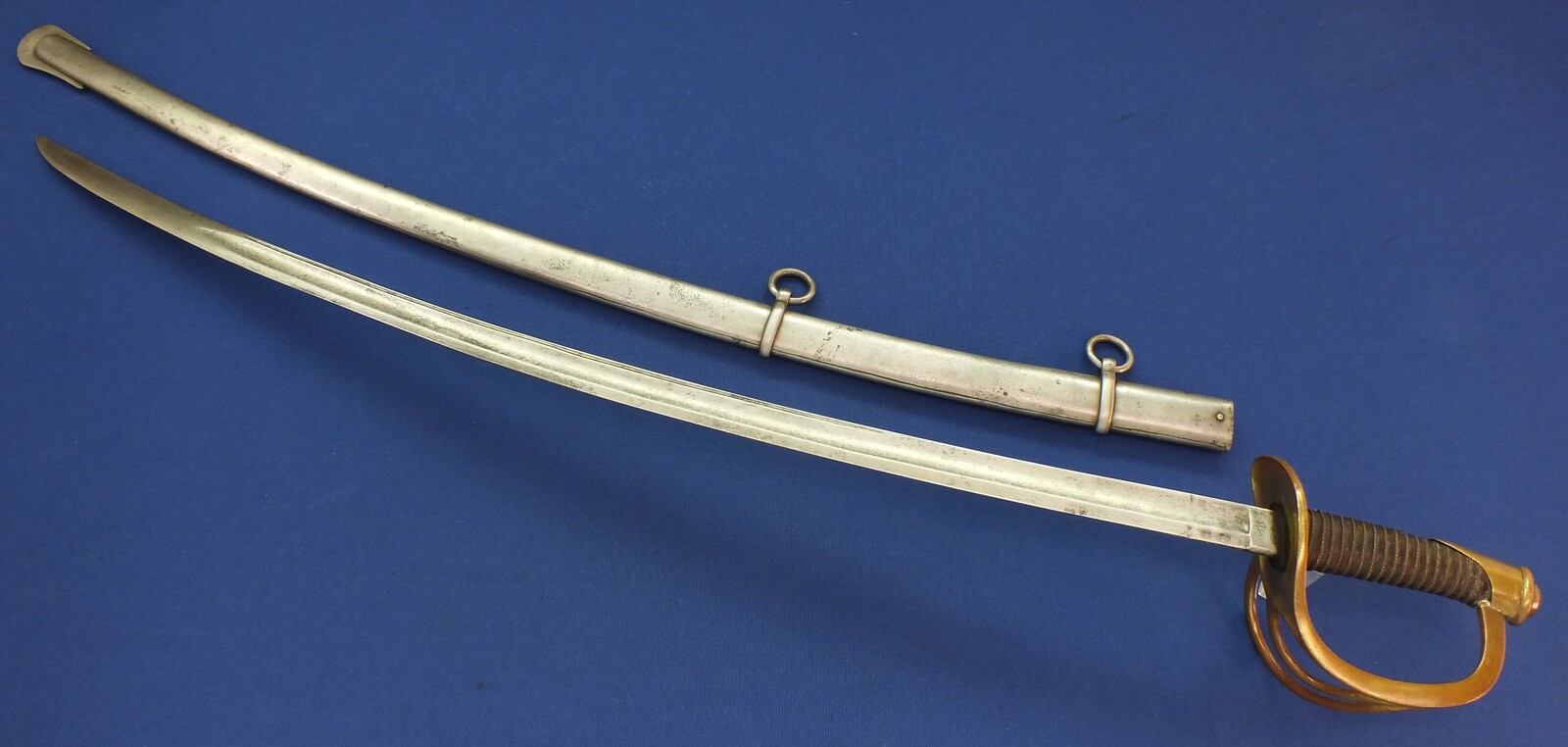 An antique American US Civil War Model 1860 Cavalry Trooper's Sword by J.E. Bleckmann Solingen. Length 106cm. In very good condition. Price 875 euro.