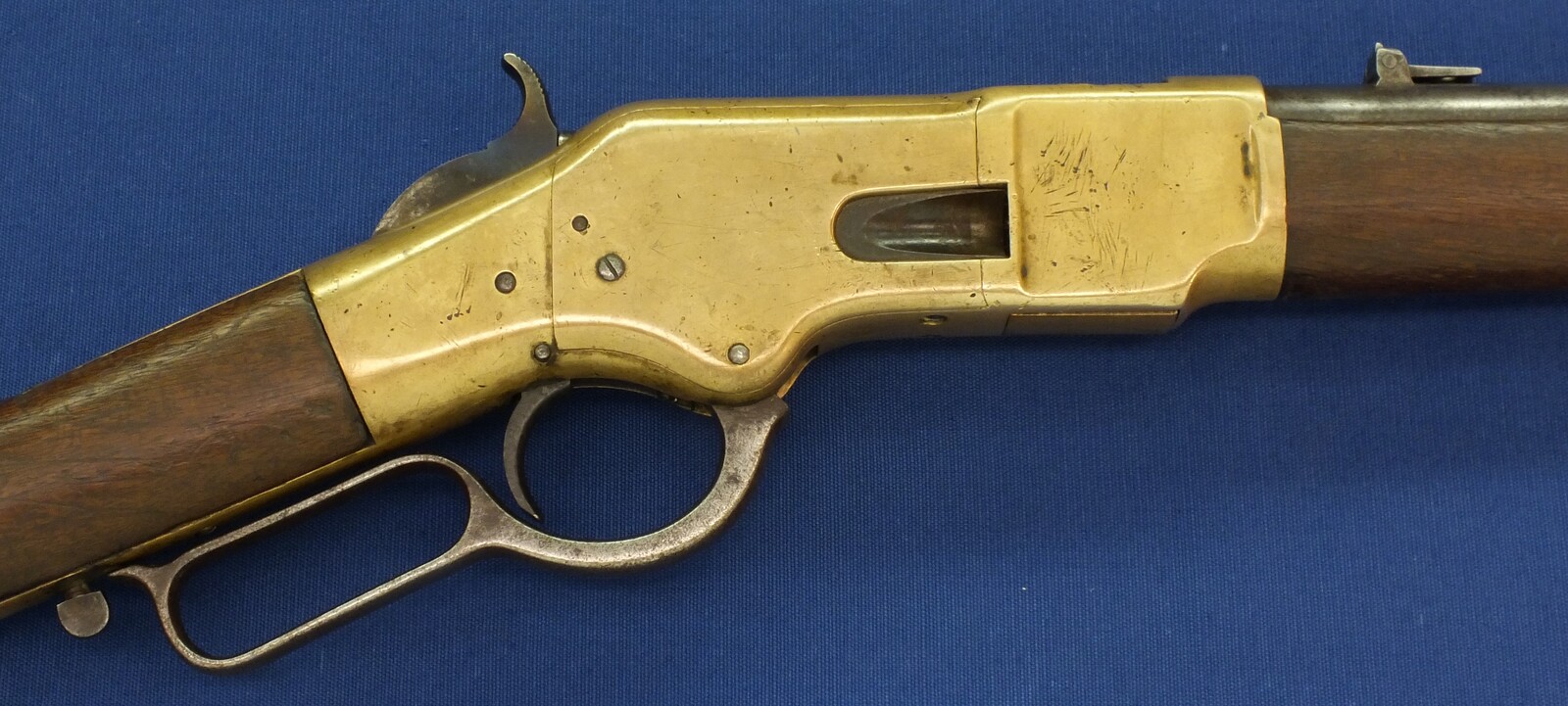 An antique American Winchester Model 1866 Yellow Boy Saddle Ring Carbine. Caliber 44 Henry Centerfire. 20 inch barrel. Length 100cm. In very good condition. Price 6.500 euro.