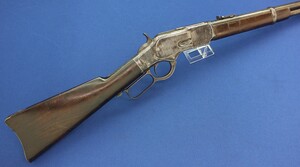 An antique American Winchester Model 1873 Saddle Ring Carbine. Caliber 38 W.C.F/38-40. 20 inch barrel with clear address. Length 99cm. In very good condition. Price 3.250 euro