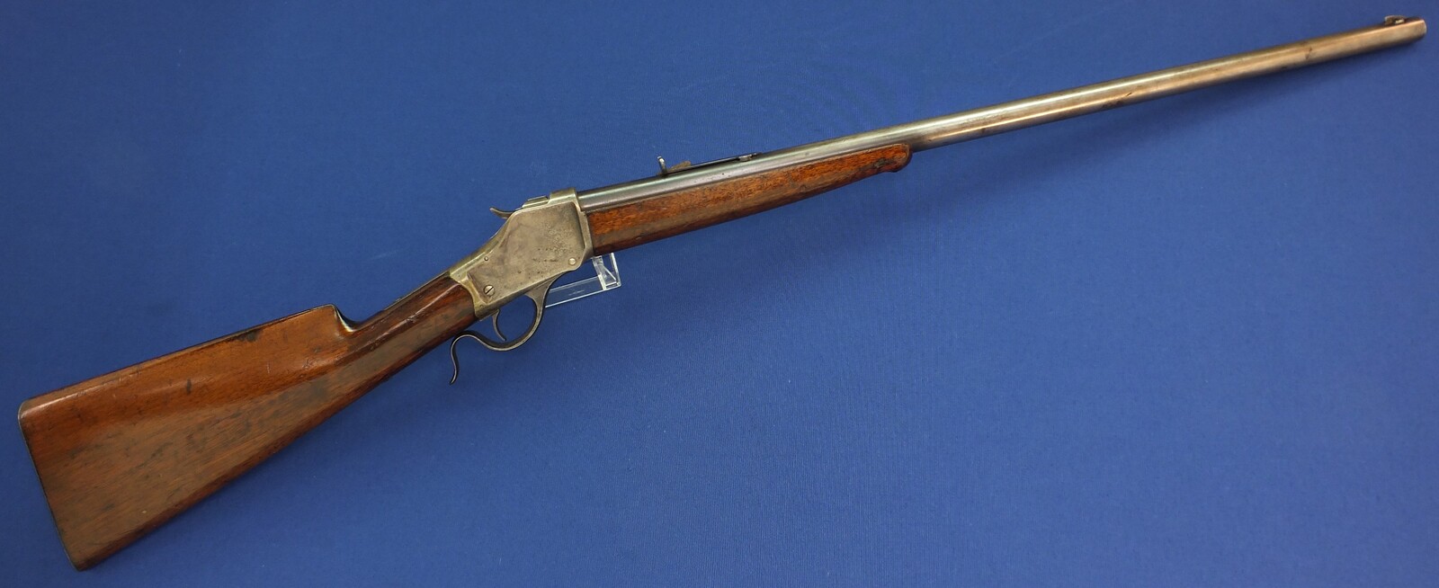 An antique American Winchester Model 1885 High Wall Single Shot Rifle. Caliber 50-95 W.C.F., 30 inch round barrel, numbered 