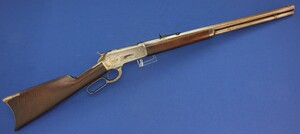 An antique American Winchester Model 1886 lever action Rifle. Caliber 38-56 W.C.F. 26 inch octagon barrel. Lenght 115cm. In very good condition. Price 2.750 euro.