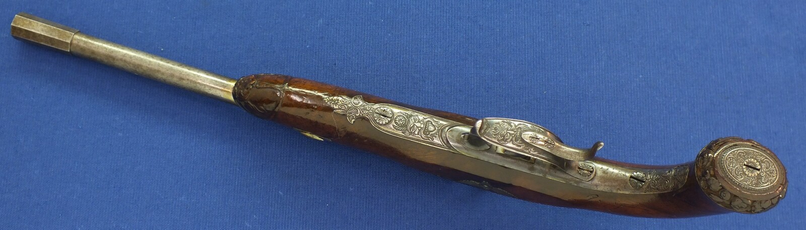 An antique Austrian 6mm Target/Saloon percussion Pistol by J.B. STRIXNER in WIEN. 10 inch barrel. Fine engraved and chiselled steel Mounts. Set-trigger. Length 41,5cm. In very good condition. Price 850 euro.