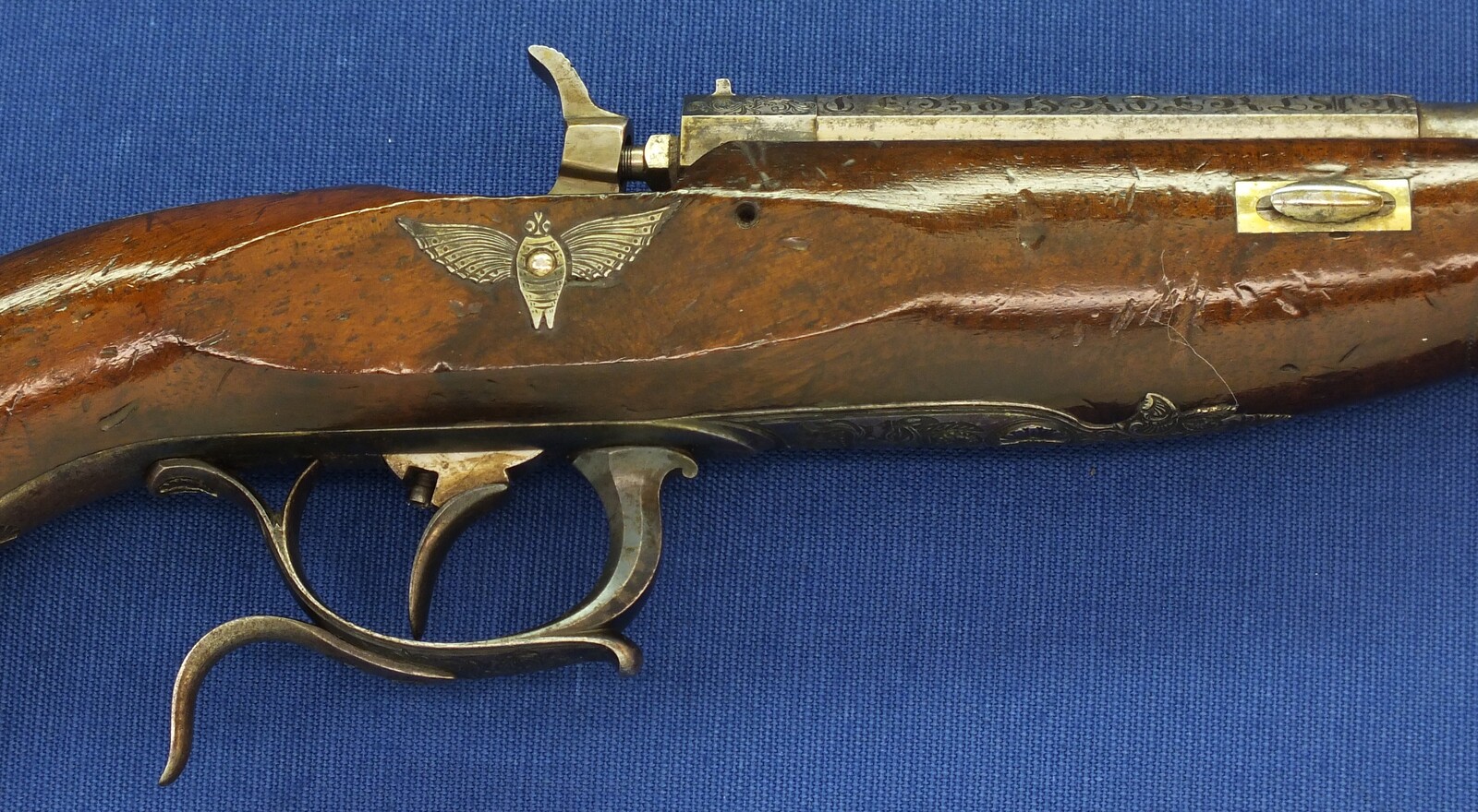 An antique Austrian 6mm Target/Saloon percussion Pistol by J.B. STRIXNER in WIEN. 10 inch barrel. Fine engraved and chiselled steel Mounts. Set-trigger. Length 41,5cm. In very good condition. Price 850 euro.