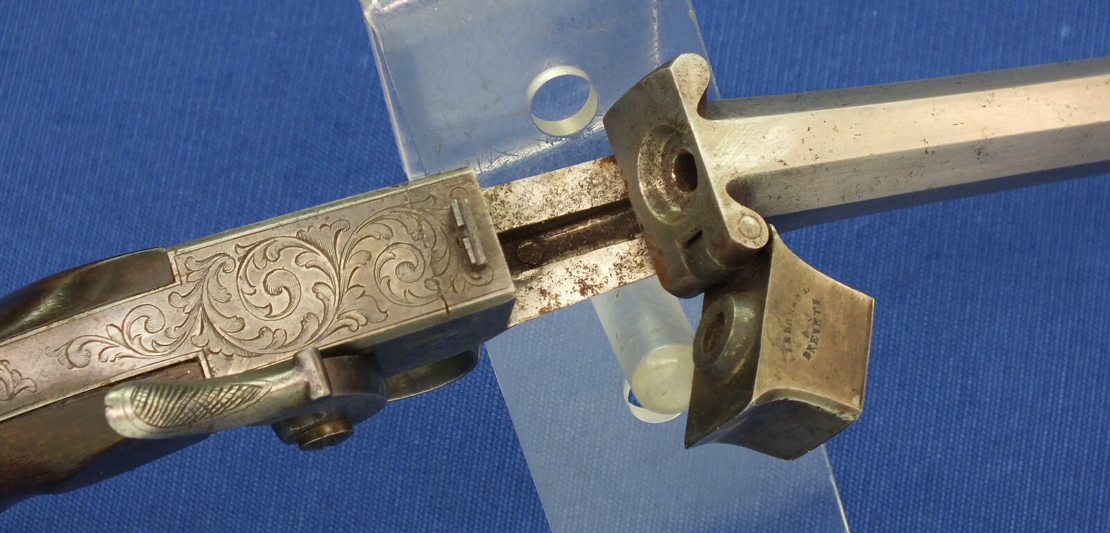 An antique Belgian 5mm Breechloading Percussion Target/Saloon pistol with internal hammer by J.J. Herman Liege. 6,5 inch octagon barrel. Length 32cm. In very good condition. Price 795 euro.