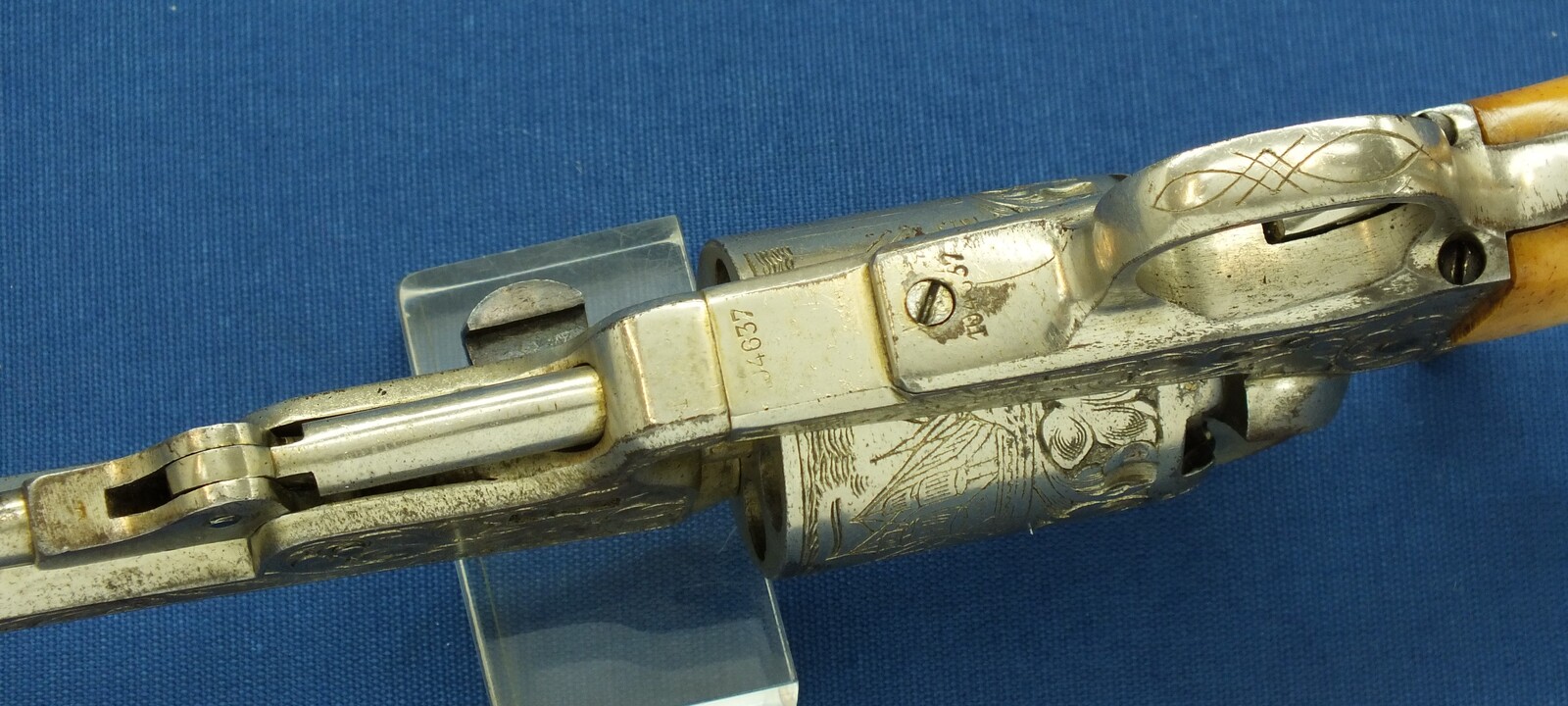 An antique Belgian Brevete engraved and Nickel Plated Colt Model 1851 Navy 6 shot Percussion Revolver by Jean-Baptiste Rongé & Fils. Caliber 35, 7 inch barrel. Length 34,5cm. In very good condition. Price 1.750 euro.