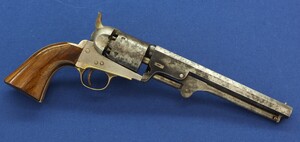 An antique Belgian Colt Brevete Model 1851 Navy 6 shot percussion Revolver by N. Gilon Liege retailed by A. Libert Amsterdam. 36 caliber, 7,5 inch barrel. Length 35cm. In very good condition. Price 2.250 euro.