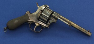 An antique Belgian E. Lefaucheux 12 shot 9mm Double and Single Action Pinfire Revolver. Length 31cm. In very good condition. Price 1.750 euro.