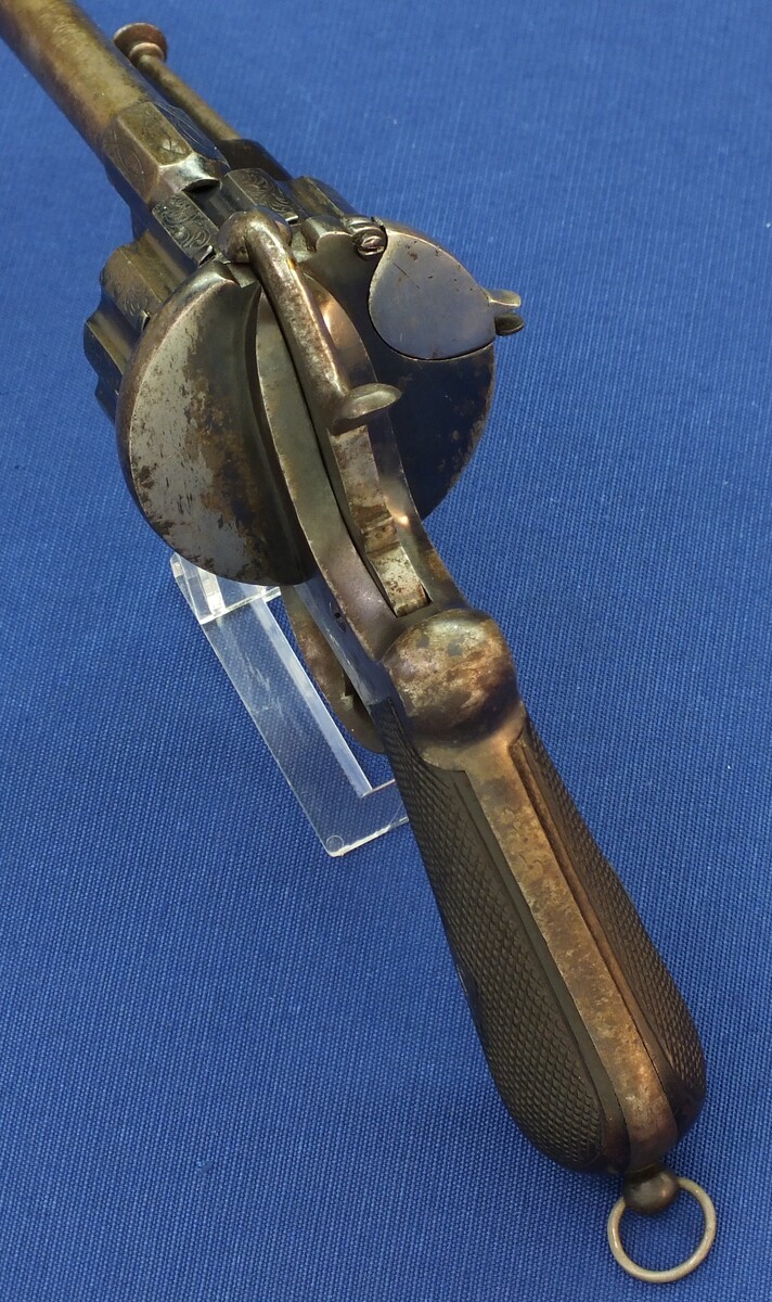 An antique Belgian E. Lefaucheux 12 shot 9mm Double and Single Action Pinfire Revolver. Length 31cm. In very good condition. Price 1.750 euro.