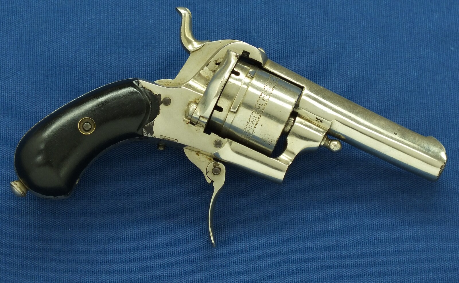 An antique Belgian made for the English market 6 shot Single and Double Action Nickel Plated Pinfire Revolver. 7mm Caliber, length 16,5cm. In very good condition. Price 425 euro.