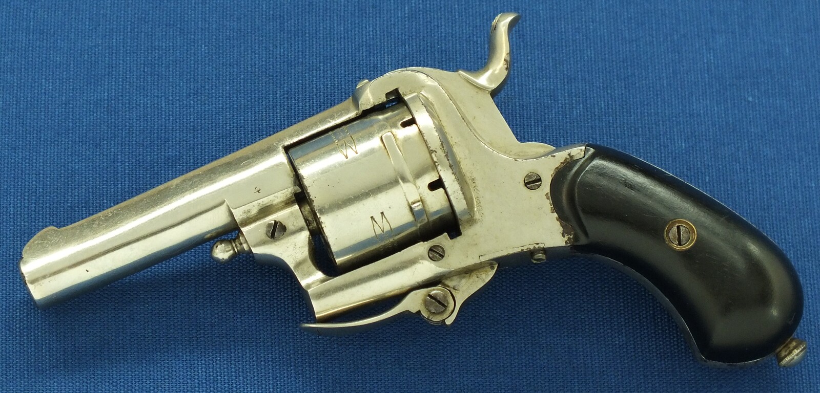 An antique Belgian made for the English market 6 shot Single and Double Action Nickel Plated Pinfire Revolver. 7mm Caliber, length 16,5cm. In very good condition. Price 425 euro.