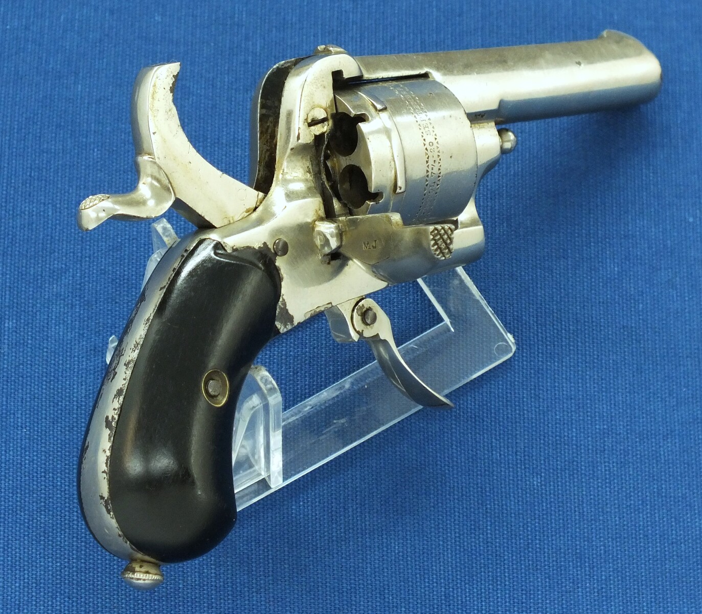 An antique Belgian made for the English market 6 shot Single and Double Action Nickel Plated Pinfire Revolver. 7mm Caliber, length 16,5cm. In very good condition. Price 425 euro.