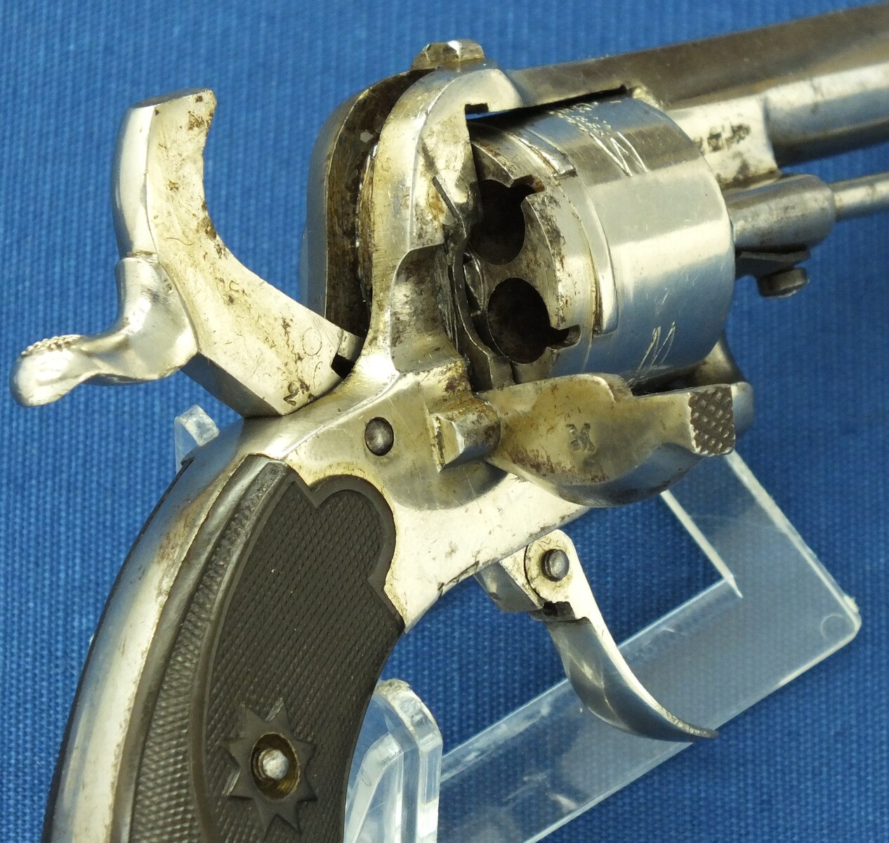 An antique Belgian made for the English market 6 shot Single and Double Action Nickel Plated Pinfire Revolver. 7mm Caliber, length 17cm. In very good condition. Price 450 euro.