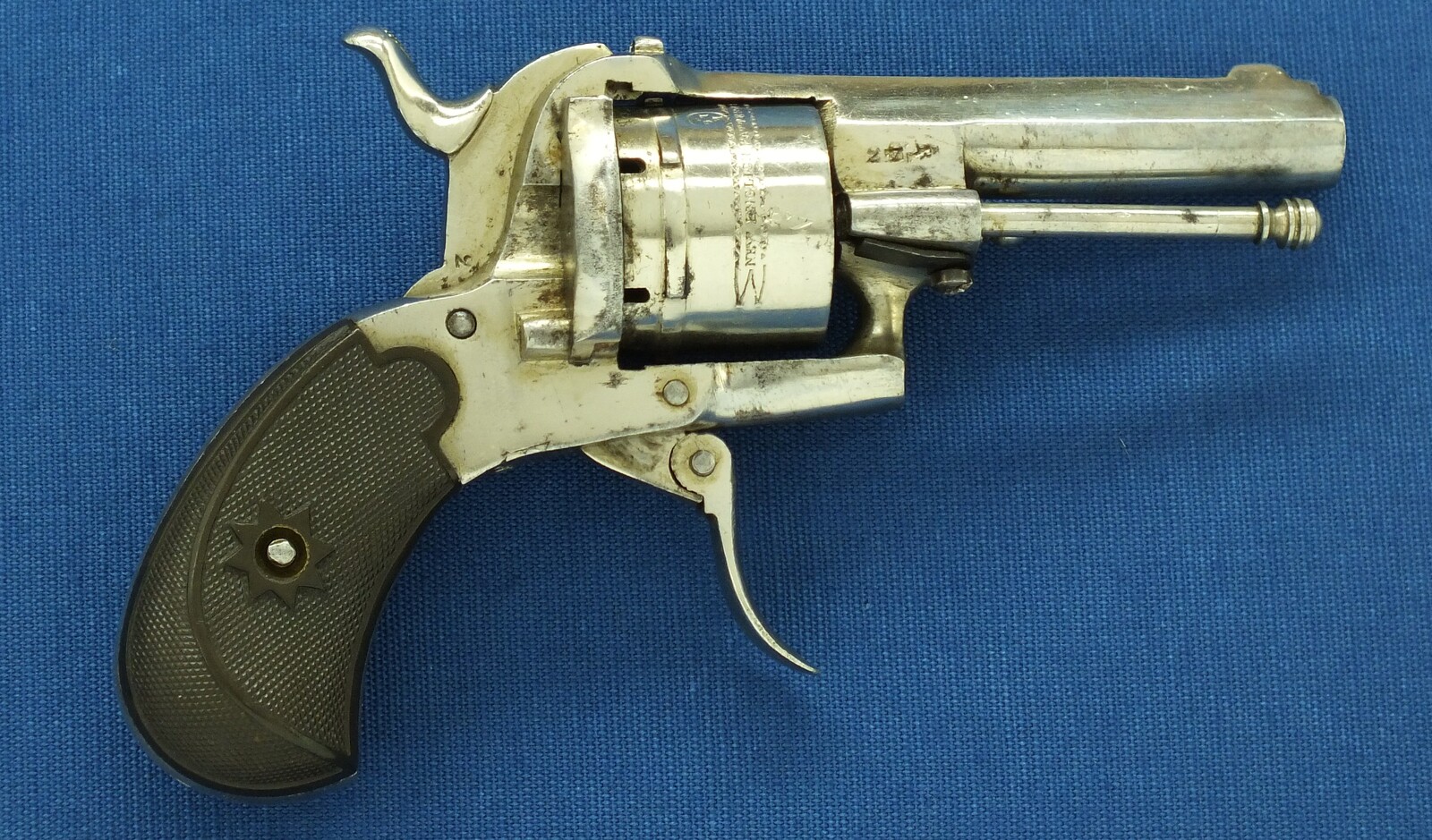 An antique Belgian made for the English market 6 shot Single and Double Action Nickel Plated Pinfire Revolver. 7mm Caliber, length 17cm. In very good condition. Price 450 euro.