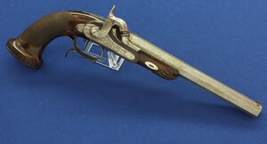 An antique Belgian Percussion Target pistol with set-trigger and 9 inch octagon Damast Barrel. Fine Walnut stock. Caliber 13mm. Length 42cm. In very good condition. Price 1.250 euro.