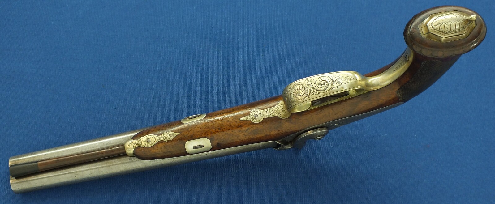 An antique Brazilian/Belgian Double Barreled Percussion Pistol by Laport Irmaos(Laport Freres) A Rio de Janeiro. Caliber 14mm smooth. 8,5 inch Damast barrels. Length 395,cm. In very good condition. Price 1.350 euro.