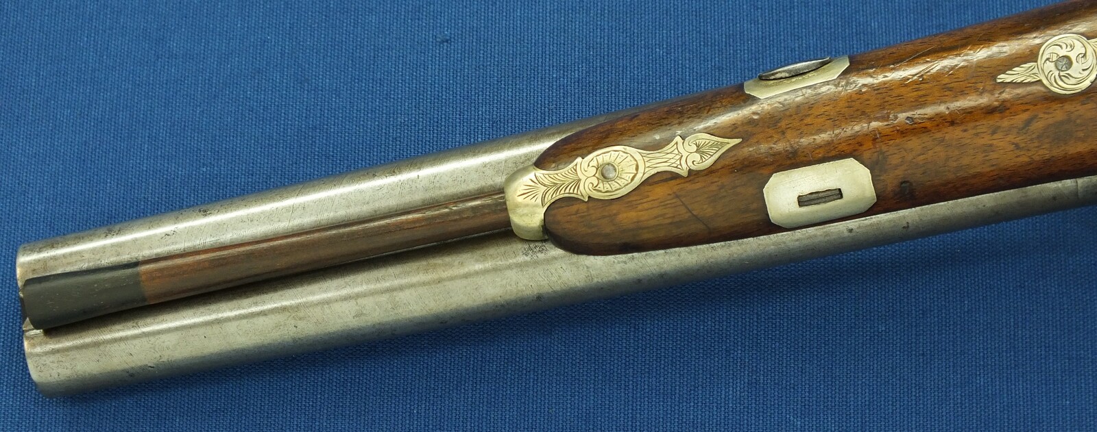 An antique Brazilian/Belgian Double Barreled Percussion Pistol by Laport Irmaos(Laport Freres) A Rio de Janeiro. Caliber 14mm smooth. 8,5 inch Damast barrels. Length 395,cm. In very good condition. Price 1.350 euro.