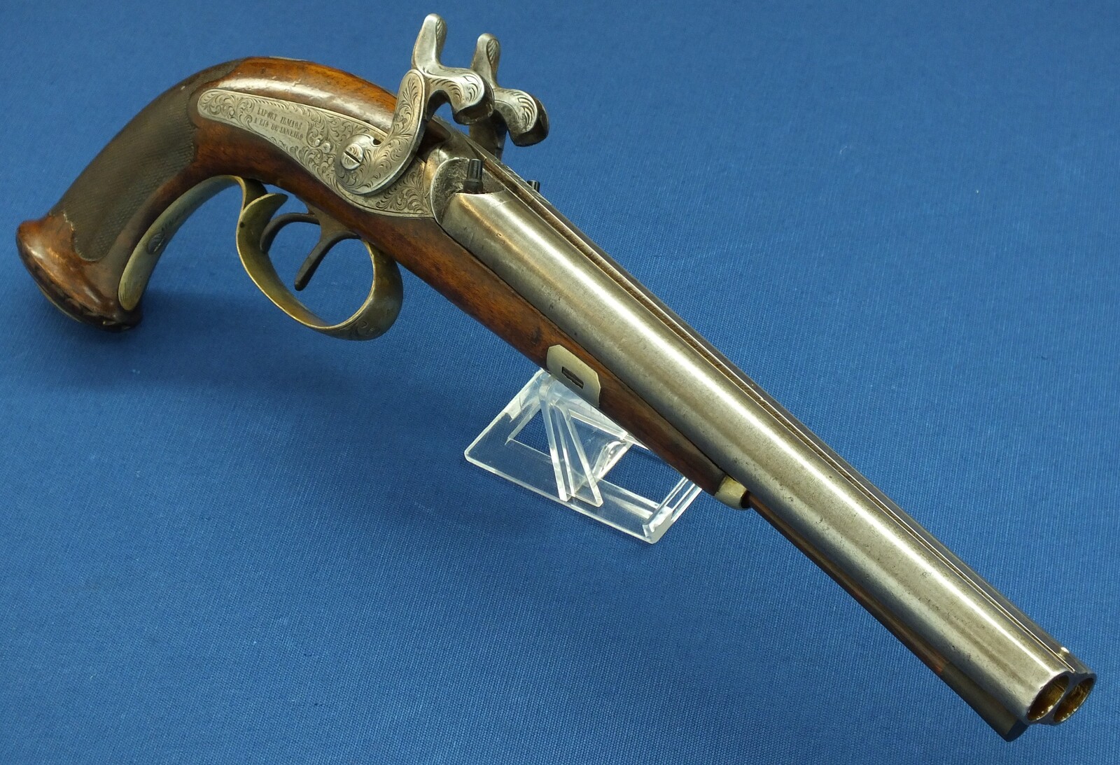 An antique Brazilian/Belgian Double Barreled Percussion Pistol by Laport Irmaos(Laport Freres) A Rio de Janeiro. Caliber 14mm smooth. 8,5 inch Damast barrels. Length 395,cm. In very good condition. Price 1.350 euro.