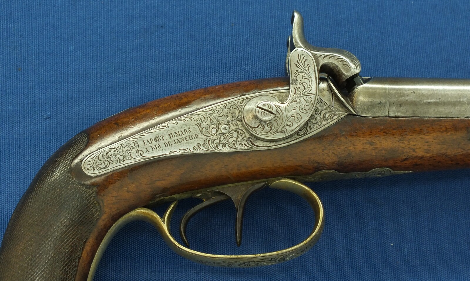 An antique Brazilian/Belgian Double Barreled Percussion Pistol by Laport Irmaos(Laport Freres) A Rio de Janeiro. Caliber 14mm smooth. 8,5 inch Damast barrels. Length 395,cm. In very good condition. Price 1.350 euro.