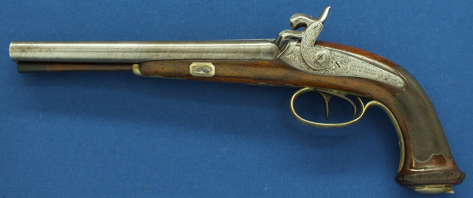 An antique Brazilian/Belgian Double Barreled Percussion Pistol by Laport Irmaos(Laport Freres) A Rio de Janeiro. Caliber 14mm smooth. 8,5 inch Damast barrels. Length 395,cm. In very good condition. Price 1.350 euro.