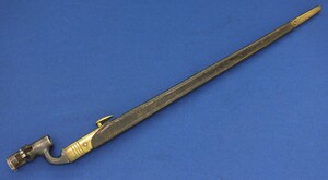 An antique British pattern 1876 socket bayonet modified in Egypt for 303 Martini-Enfield Rifle. Length 65cm. In very good condition. Price 195 euro