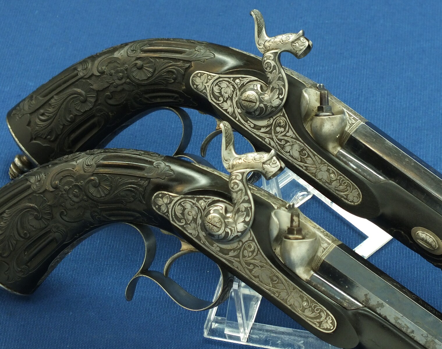 An antique cased French pair of Percussion pistols by Firmin Paris, successor of Alphonse Caron circa 1860. 12mm Caliber, length 43cm. In very good condition. Price on request.