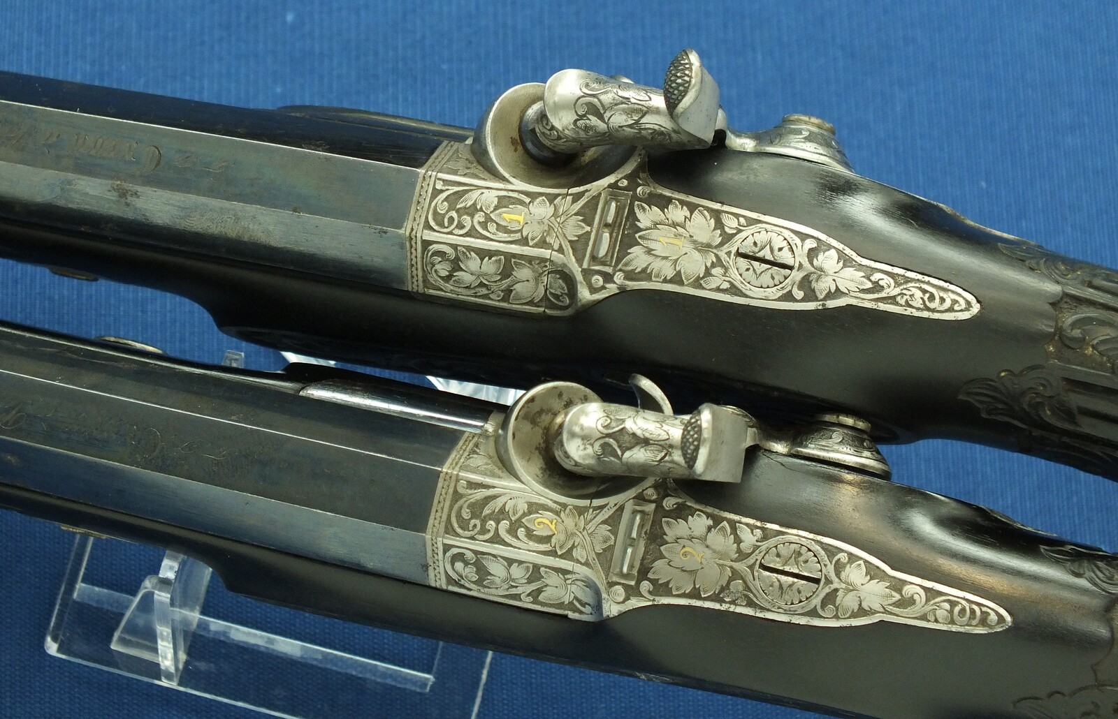 An antique cased French pair of Percussion pistols by Firmin Paris, successor of Alphonse Caron circa 1860. 12mm Caliber, length 43cm. In very good condition. Price on request.