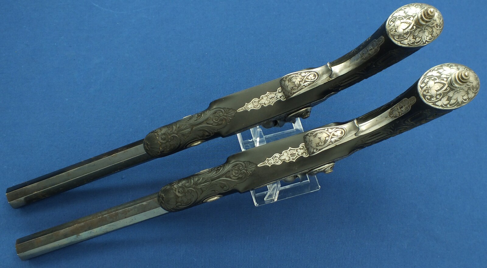 An antique cased French pair of Percussion pistols by Firmin Paris, successor of Alphonse Caron circa 1860. 12mm Caliber, length 43cm. In very good condition. Price on request.