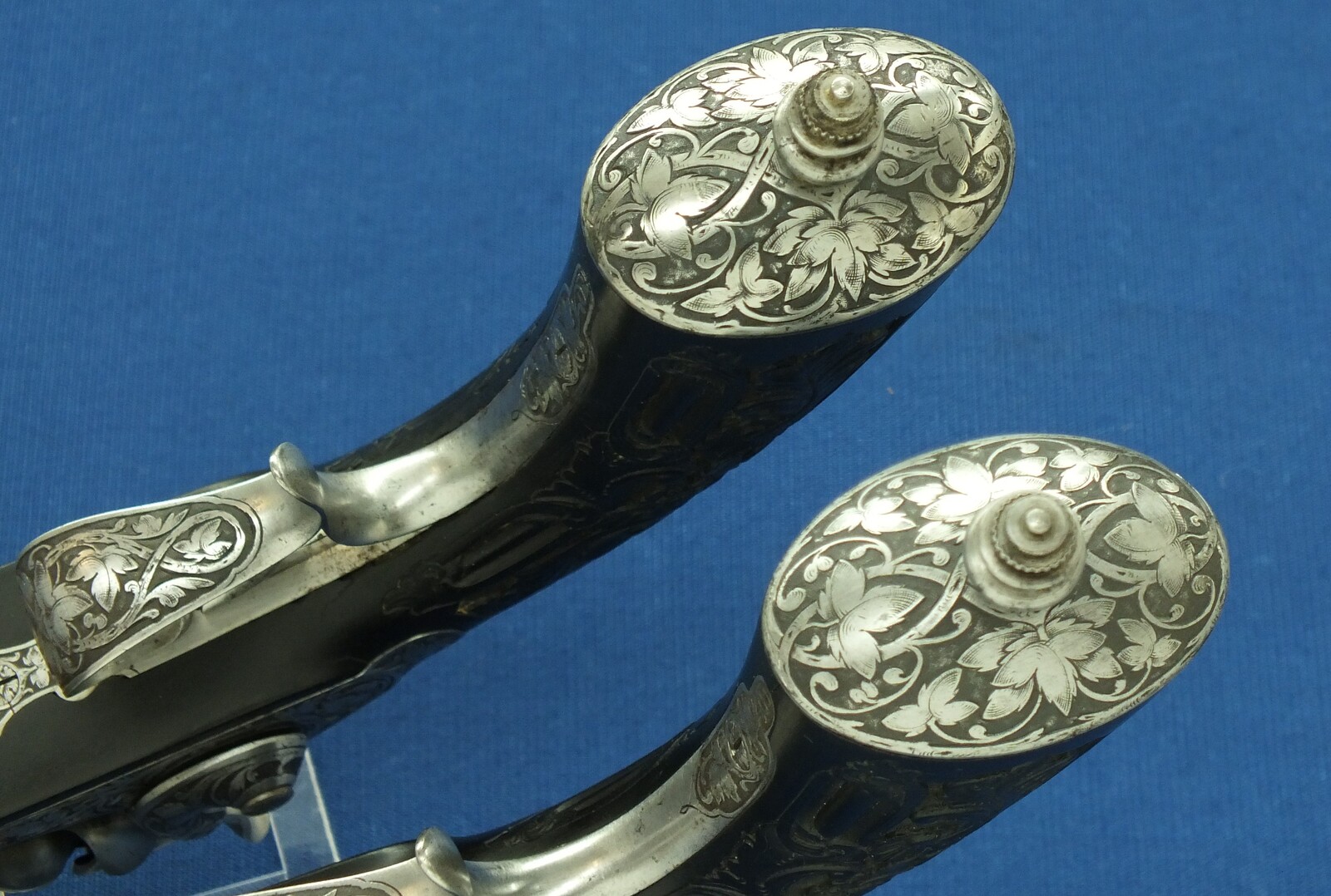 An antique cased French pair of Percussion pistols by Firmin Paris, successor of Alphonse Caron circa 1860. 12mm Caliber, length 43cm. In very good condition. Price on request.