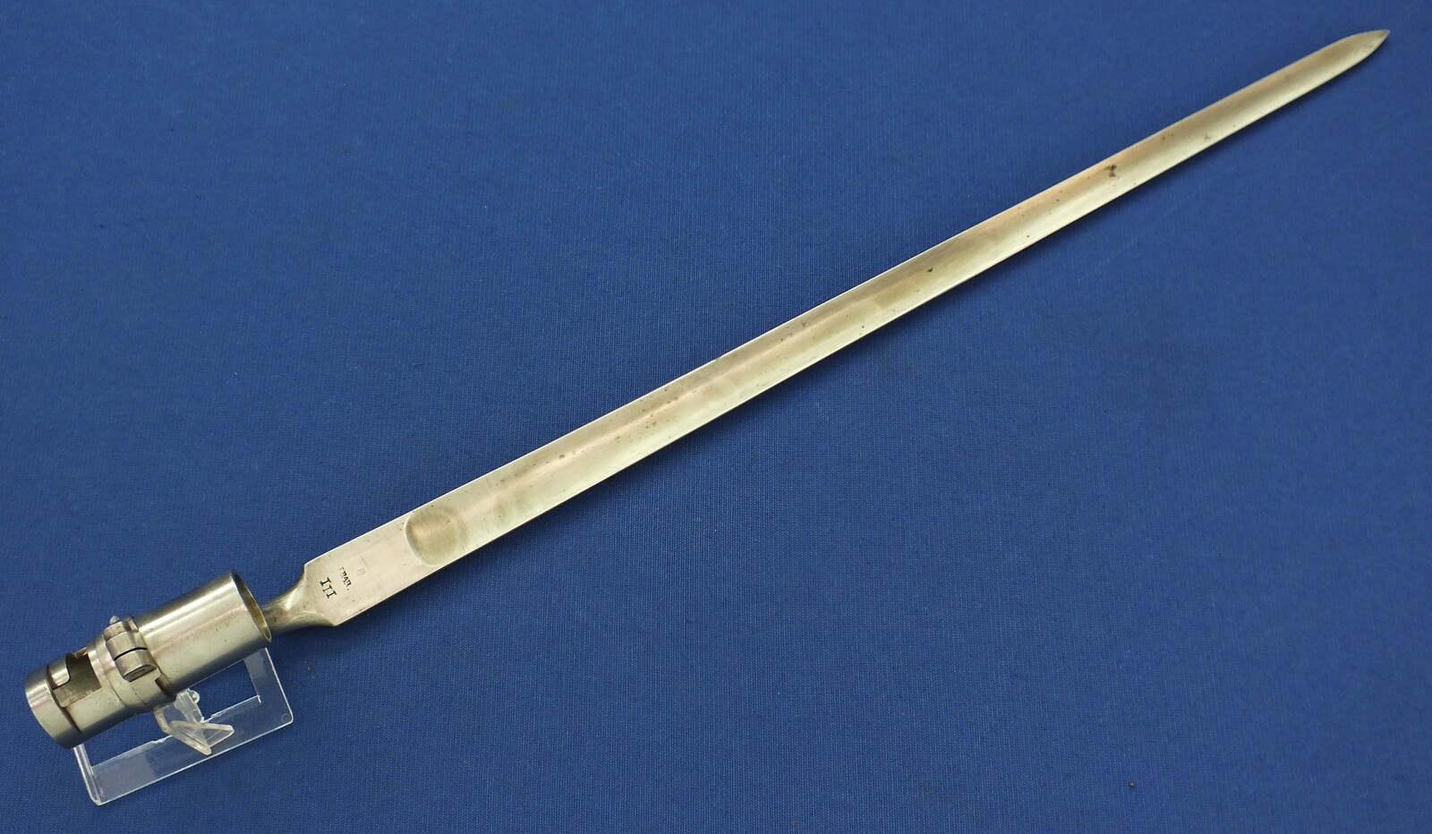 An antique Dutch Bayonet with leather scabbard Model 1815 for Flintlock, percussion and Snider Muskets. Made by J. Bar (Delft) Length 52cm. In very good condition