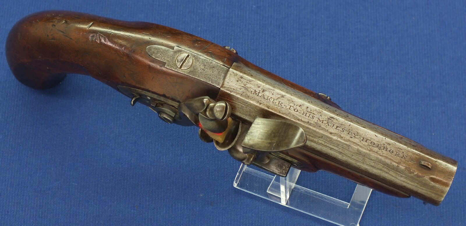 An antique English 18 bore Flintlock overcoat/constabulary pistol by William Parker maker to his Majesty Holborn (London) circa 1820-30. Length 25cm. In very good condition. Price 1.250