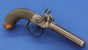 An antique English 19th century circa 1850 Box-Lock percussion double barreled pistol. By George Adams. Caliber 12mm. Length 25,5cm. In very good condition. Price 950 euro.