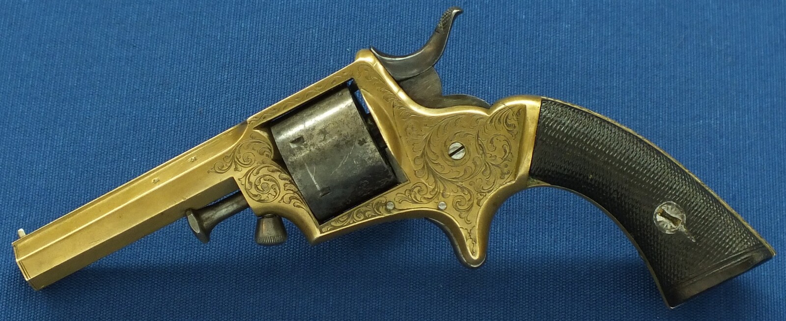 An antique English Tranter's patent 6 shot Caliber 30 Rimfire Revolver by Charles Osborne Birmingham. Length 19cm. In good/very good condition. 