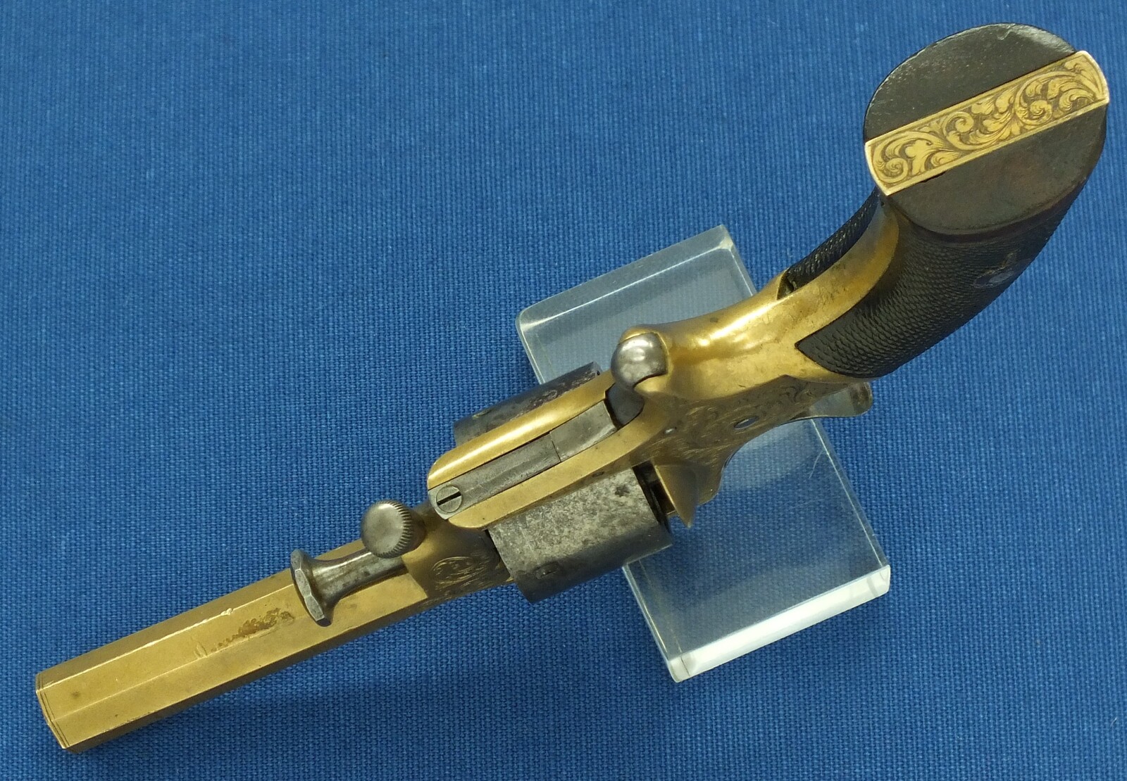 An antique English Tranter's patent 6 shot Caliber 30 Rimfire Revolver by Charles Osborne Birmingham. Length 19cm. In good/very good condition. 