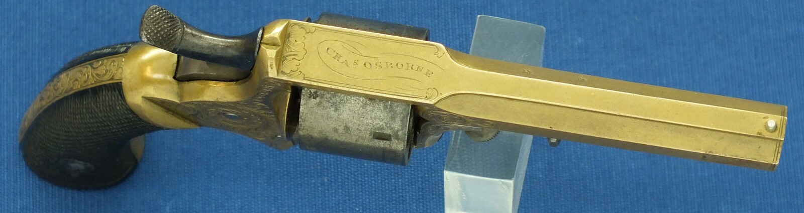 An antique English Tranter's patent 6 shot Caliber 30 Rimfire Revolver by Charles Osborne Birmingham. Length 19cm. In good/very good condition. 