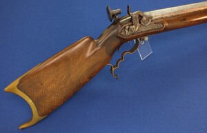 An antique heavy German or Swiss percussion Stutzer/target Rifle. Caliber 10mm. 85,5cm Octagon Barrel. Length 124cm. In good condition.