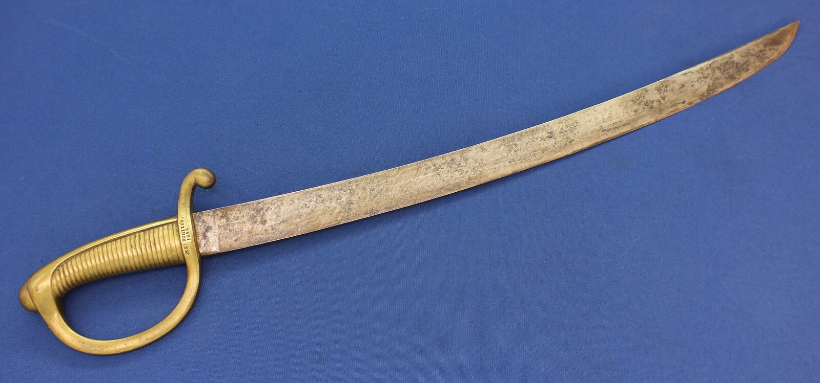 An antique probably Swiss Model AN IX Briquet infantry Sword. Signed Jak Schjzer and dated 1845. Length 74cm. In good condition. Price 150 euro.