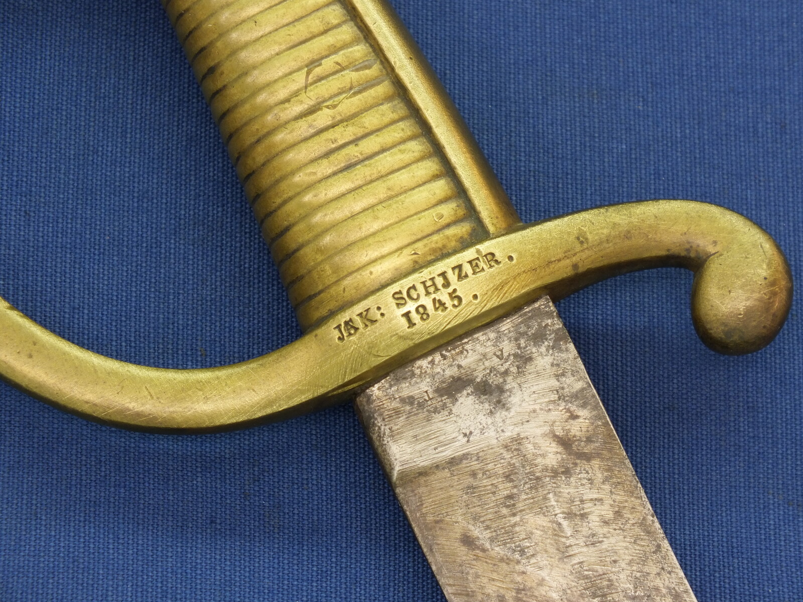 An antique probably Swiss Model AN IX Briquet infantry Sword. Signed Jak Schjzer and dated 1845. Length 74cm. In good condition. Price 150 euro.